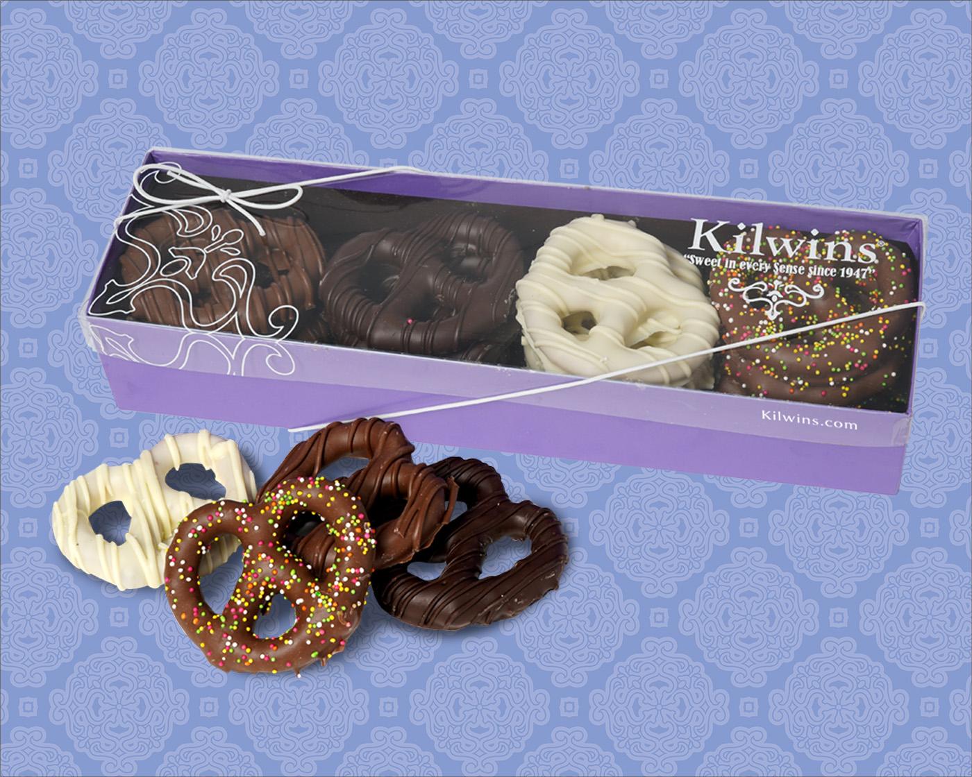 16 piece chocolate-dipped pretzel twists in assorted milk, dark & white chocolate in box