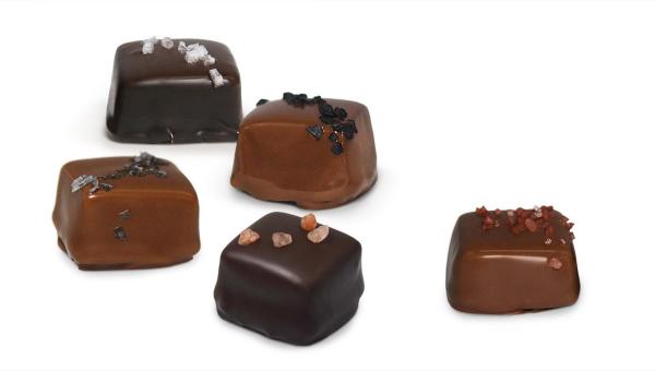 an array of milk and dark chocolate sea-salt caramels