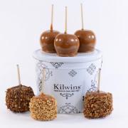 Photo of various Caramel Apples and Kilwins Tin