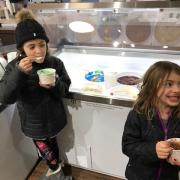 Photo of two children enjoying ice cream at Kilwins