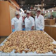 photo of franchisees in front of caramel corn