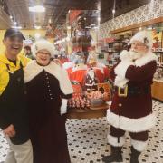 Picture of Santa and Mrs. Claus shopping at Kilwins San Antonio