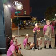 Team takes a break during downtown Fireworks