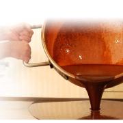 Pouring Fudge onto Marble Table